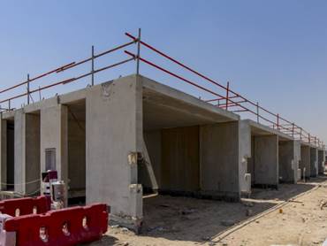 Aerial view of swimming pool at Mudon Al Ranim townhouses in Dubailand, developed by Dubai Properties